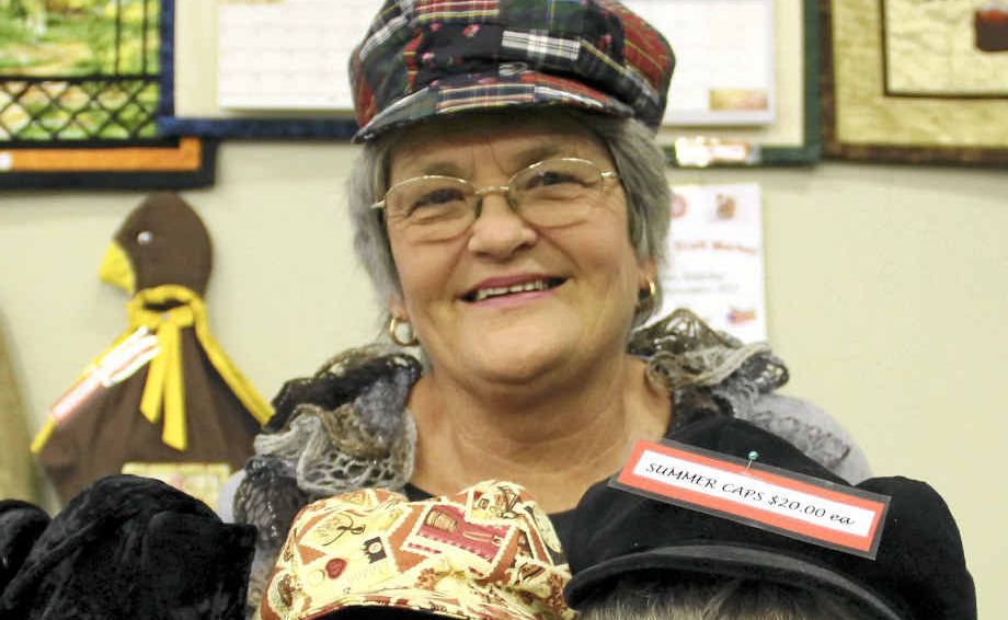 CAPPING OFF THE FUN: Janice Timmer enjoys the craft expo, now in its 15th year. CAPPING OFF THE FUN: Janice Timmer enjoys the craft expo, now in its 15th year.